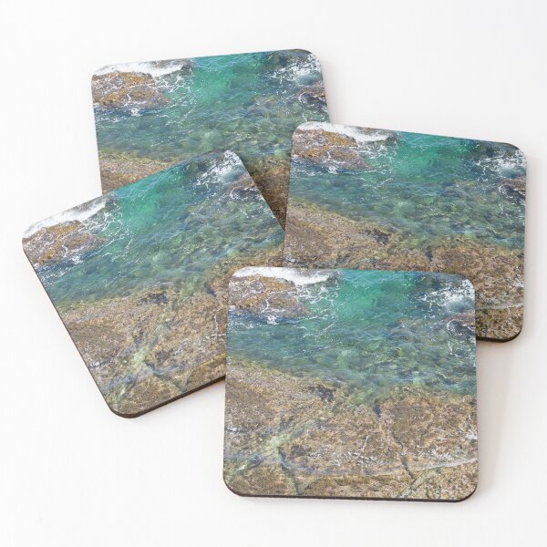 Item preview, turquoise blue water and rocks on the coast designed and sold by Adriana Mueller.