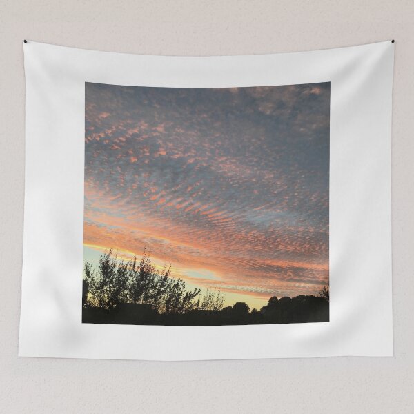 Item preview, Magical golden sunset clouds in blue sky on summer evening in Ireland designed and sold by LeBreab.