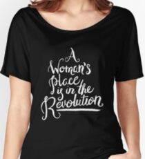 A WOMAN'S PLACE IS IN THE REVOLUTION Women's Relaxed Fit T-Shirt