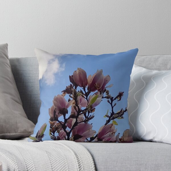 Item preview, Magnolia branches against a blue sky designed and sold by Ninaeva.