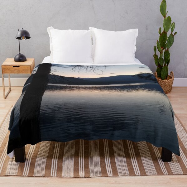 Item preview, Shimmering evening sunset on a mountain lake. Beautiful blues, greys, orange, silver and black. designed and sold by MountMercantile.