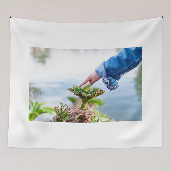 Item preview, Child hand while pointing her finger to a small plant designed and sold by Artsy Boulevard.