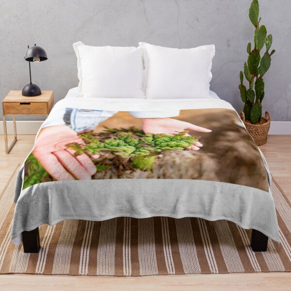 Item preview, Childs hand while holding a dying plant designed and sold by Artsy Boulevard.