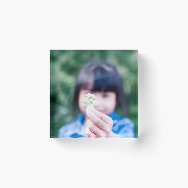 Item preview, Child's hand holding a small flower designed and sold by Artsy Boulevard.