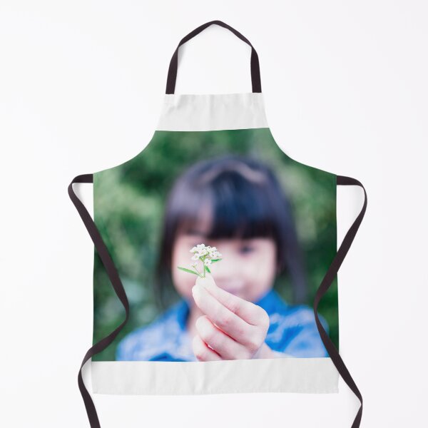 Item preview, Child's hand holding a small flower designed and sold by Artsy Boulevard.