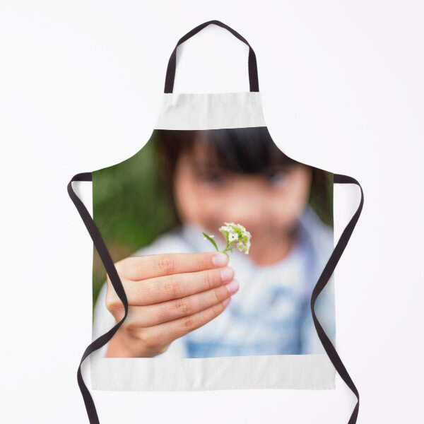 Item preview, Child's hand holding a small flower designed and sold by Artsy Boulevard.