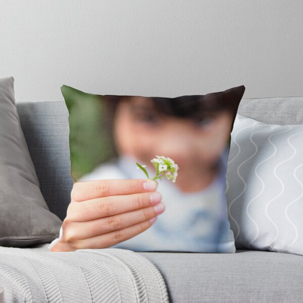 Item preview, Child's hand holding a small flower designed and sold by Artsy Boulevard.