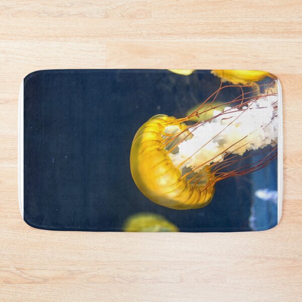 Item preview, Jellyfish sea nettle is an animal that is found in ocean also called as Medusa Jellyfish. Glowing aquatic animal yellow color on black background designed and sold by Artsy Boulevard.