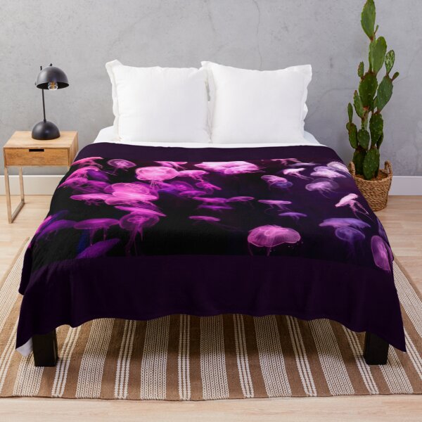 Item preview, Jellyfish animal that is found in ocean also called as Moon Jellyfish. Glowing pink color on black background designed and sold by Artsy Boulevard.