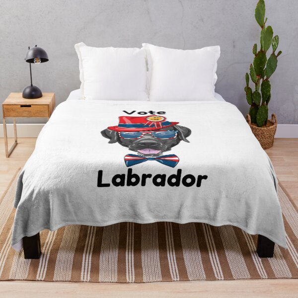 Item preview, Black Labrador Dog Vote Labour Pun Cute Pet Dog Wearing Hat and Sunglasses designed and sold by ChooproClothing.