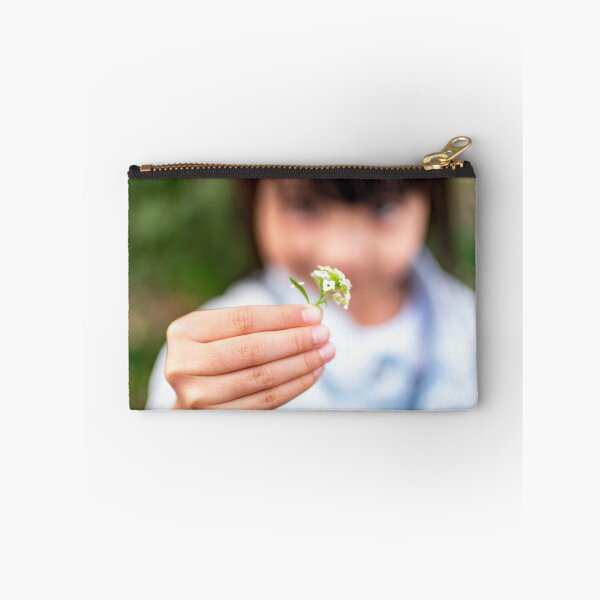 Item preview, Child's hand holding a small flower designed and sold by Artsy Boulevard.