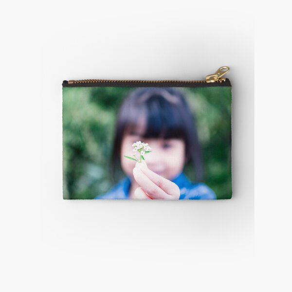 Item preview, Child's hand holding a small flower designed and sold by Artsy Boulevard.