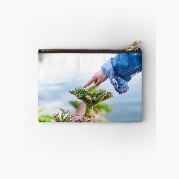 Item preview, Child hand while pointing her finger to a small plant designed and sold by Artsy Boulevard.