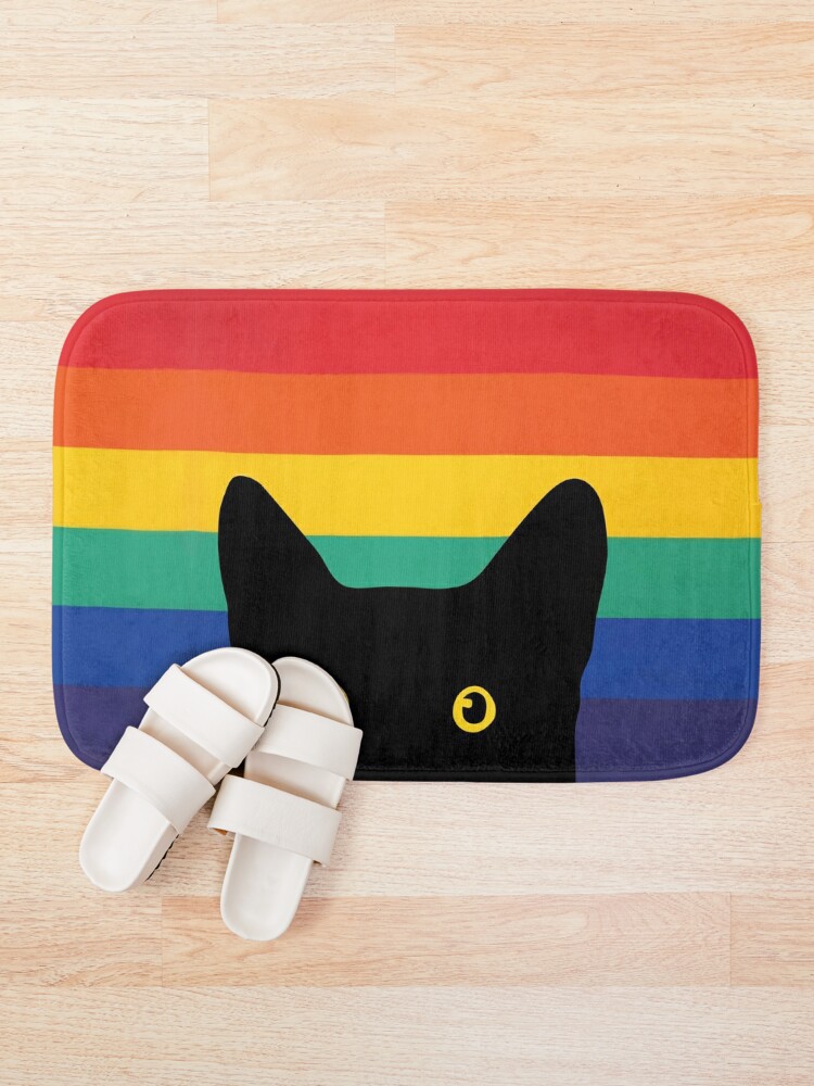 sneaky cat Bath Mat for Sale by lauragraves