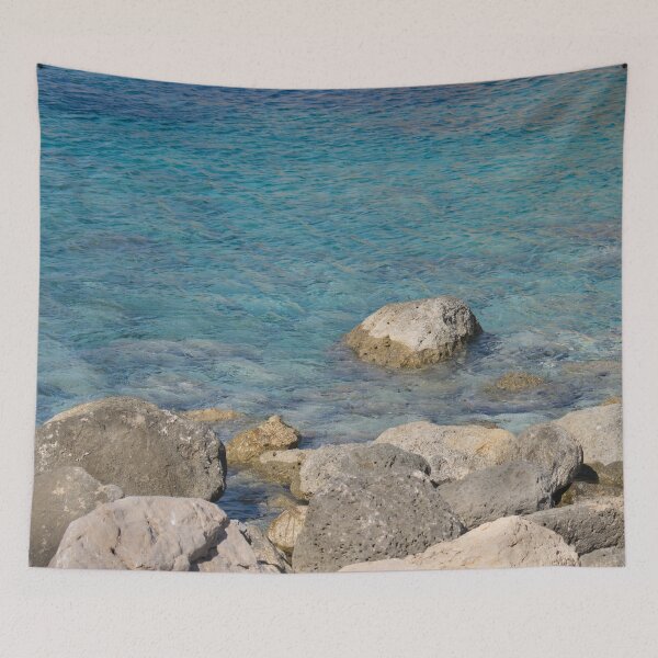 Item preview, clear blue water with waves and rocks designed and sold by moonaliara.