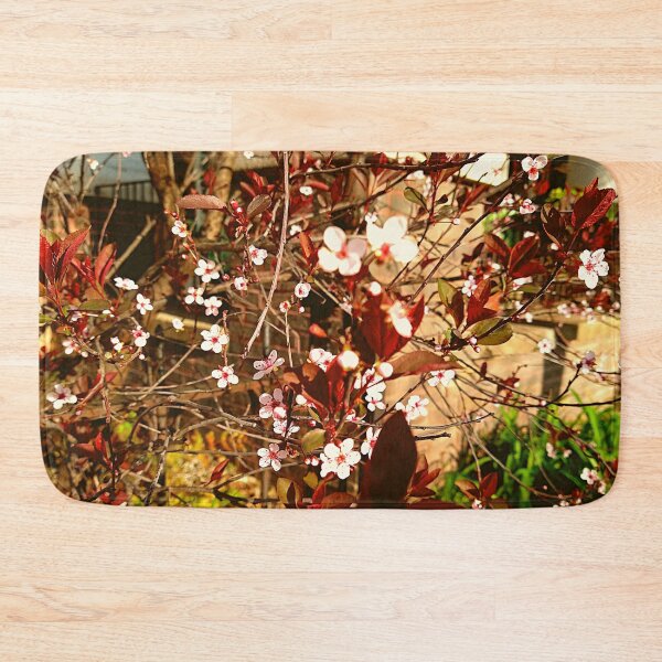 Item preview, Sand Cherry Tree Blossoms In The Foreground Of Brick Building designed and sold by Mothe3rd.