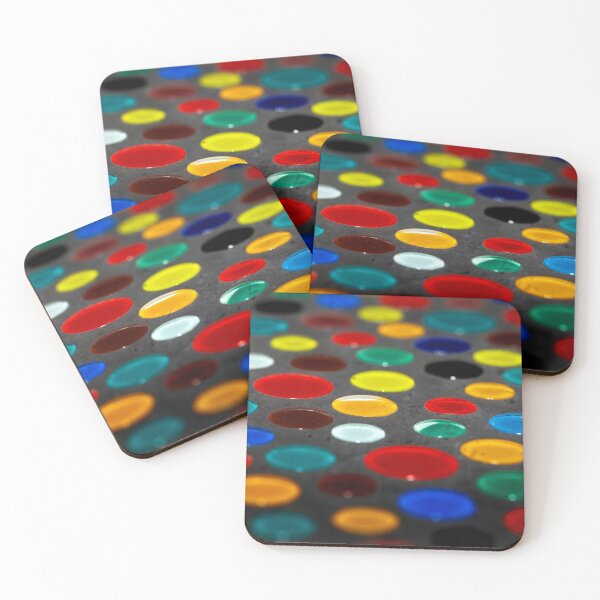 Item preview, Abstract photo of different colored glass drops in grey concrete. designed and sold by Zosimus.
