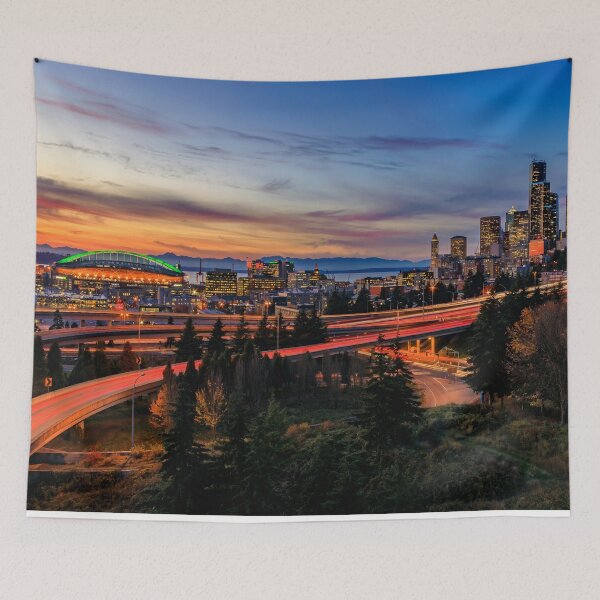 Item preview, Seattle downtown skyline beyond the I-5 I-90 freeway interchange at sunset with long exposure traffic trail lights from Dr. Jose Rizal or 12th Avenue South Bridge. designed and sold by SvetlanaSF.