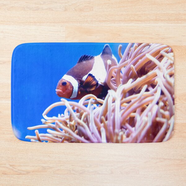 Item preview, Blurry photo of a clownfish or anemonefish and corals in a aquarium for background image of underwater scene designed and sold by Artsy Boulevard.