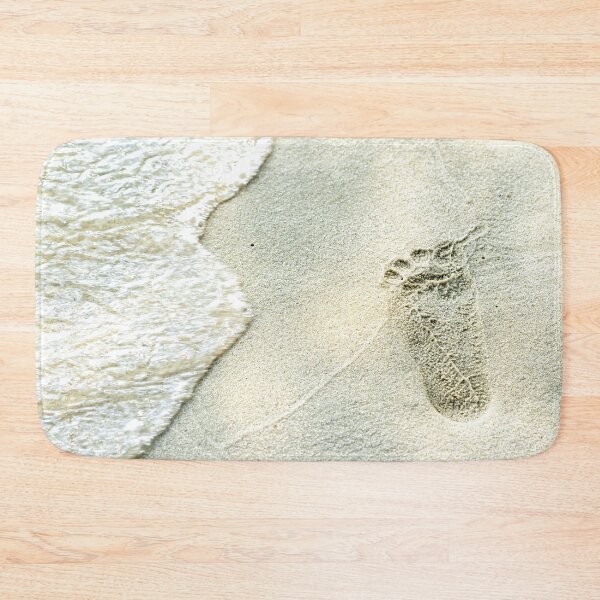 Item preview, traces of feet on the sand. Texture background Footprints of human feet on the sand near the water on the beach designed and sold by Artsy Boulevard.