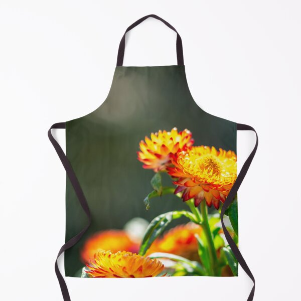 Item preview, Macro closeup shot of an orange flower with soft blurry green background and space for text designed and sold by Artsy Boulevard.