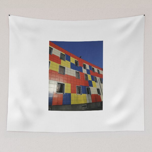 Item preview, multicolored city house against the blue sky designed and sold by Olga Kydryavskaya.