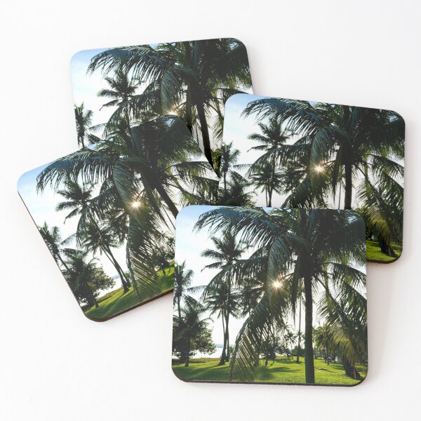 Item preview, Coconut trees near the beach with green grass and bright sun designed and sold by Artsy Boulevard.