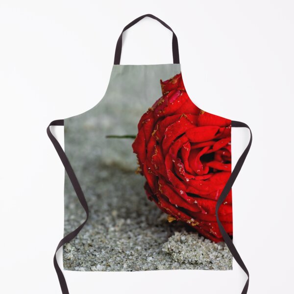 Item preview, Rose dirty and covered with sand on a beach. Red rose dusty left on a beach sand great as girly pattern designed and sold by Artsy Boulevard.