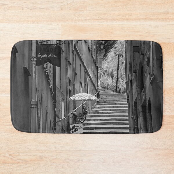 Item preview, Original fine art photo print featuring a black and white view of a narrow crooked street in the Old Town, Vieille Ville in Nice on the French Riviera. designed and sold by SvetlanaSF.