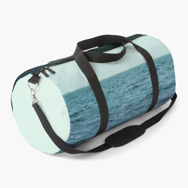 Item preview, A water breaker against the background of the Black Sea on a bright cloudless day, natural background designed and sold by helenkaiy.