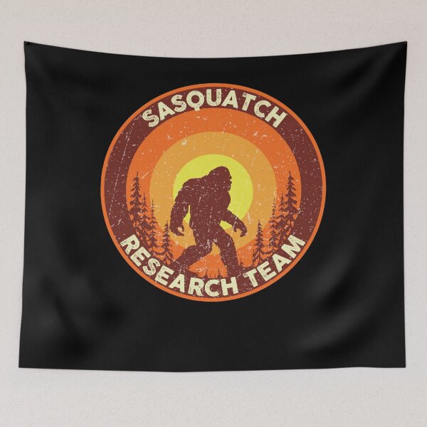 Item preview, Vintage Sasquatch Research Team Retro Bigfoot Distressed Graphic designed and sold by wdyoungblood.