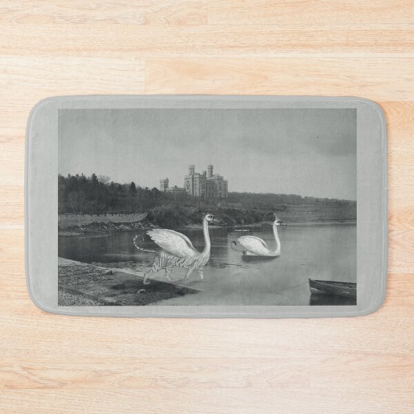 Fantasy animals swimming by a castle in Scotland Bath Mat