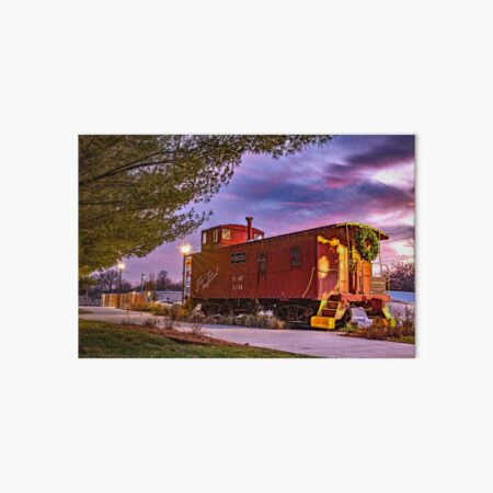 Item preview, Sunset At The Frisco Centennial Caboose In Downtown Rogers Arkansas designed and sold by Gregory Ballos.