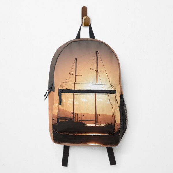 Item preview, Backlit Yacht at Sunset on the Port of Naxos, Cyclades, Greece designed and sold by JarbasVisuals.
