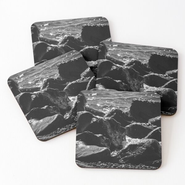 Item preview, Black and White Water-Washed Rocks at White Beach, Santorini, Greece designed and sold by JarbasVisuals.