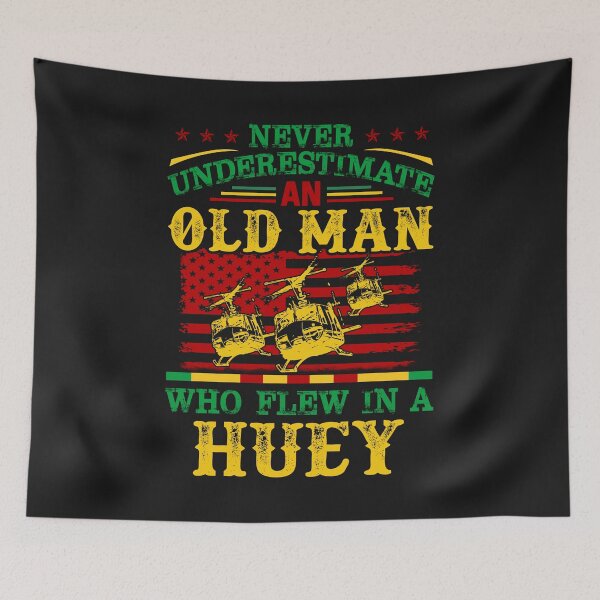 Item preview, Never Underestimate An Old Man Who Flew In A Huey backprinted unisex shirt designed and sold by Lukifo-Epic.