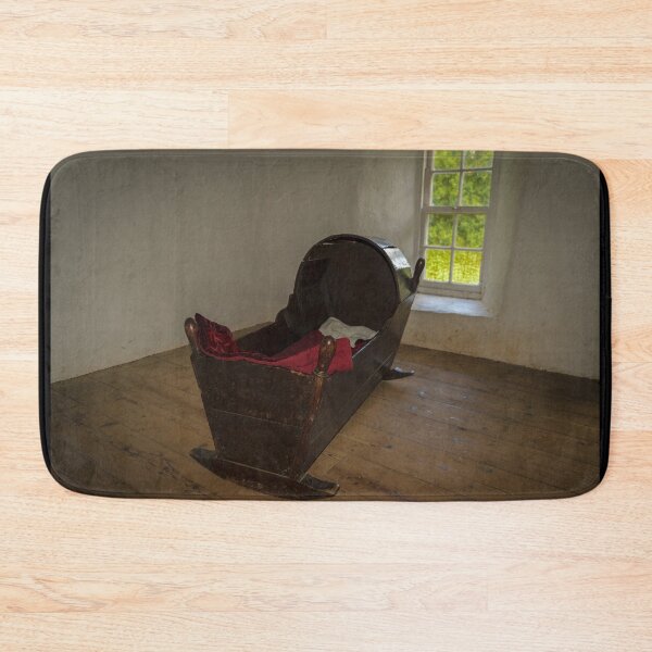 Item preview, Wooden vintage antique rocking baby bed with the red blanket, in empty dark room with window and wooden floor designed and sold by AlbertMi.