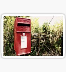 Vintage red postbox in the countryside Sticker