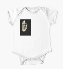 gesturing fearlessness & understanding One Piece - Short Sleeve
