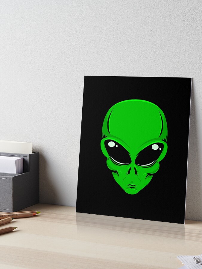 Green alien head with big black eyes