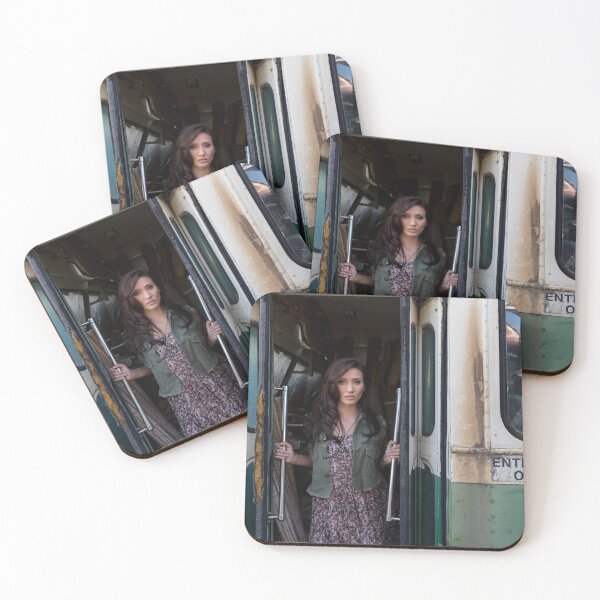 Woman standing in the doorway of a derelict bus Coasters (Set of 4)