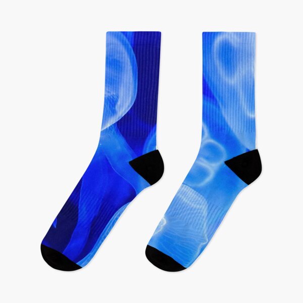 Item preview, Jellyfish animal that is found in ocean also called as Moon Jellyfish. Glowing blue color on black background designed and sold by Artsy Boulevard.