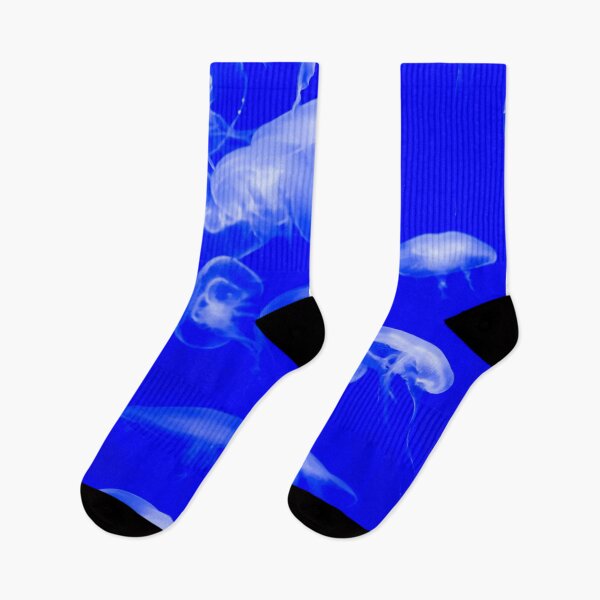 Item preview, Jellyfish animal that is found in ocean also called as Moon Jellyfish. Glowing blue color on black background designed and sold by Artsy Boulevard.