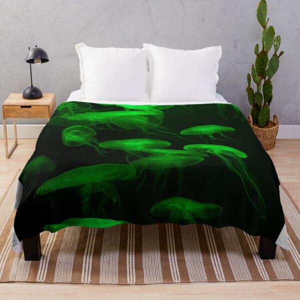 Item preview, Jellyfish animal that is found in ocean also called as Moon Jellyfish. Glowing green color on black background designed and sold by Artsy Boulevard.