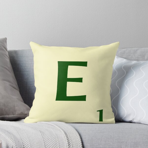 Ficha de Scrabble de la E de 1 punto Cojín