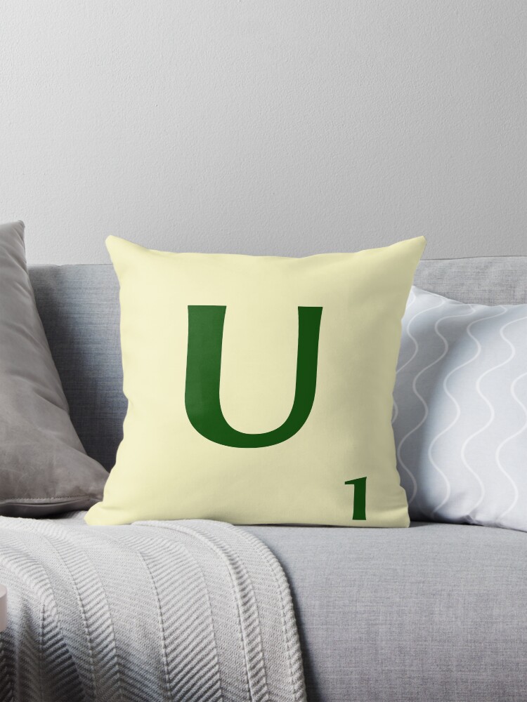 Imagen 1 de 4, Cojín con la obra Ficha de Scrabble de la U de 1 punto, diseñada y vendida por fgrdisseny.