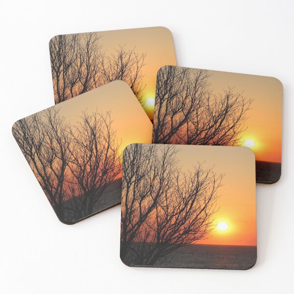 Item preview, Bare Tree In Front Of Sunset Over The Ocean designed and sold by Sarah Tepe.