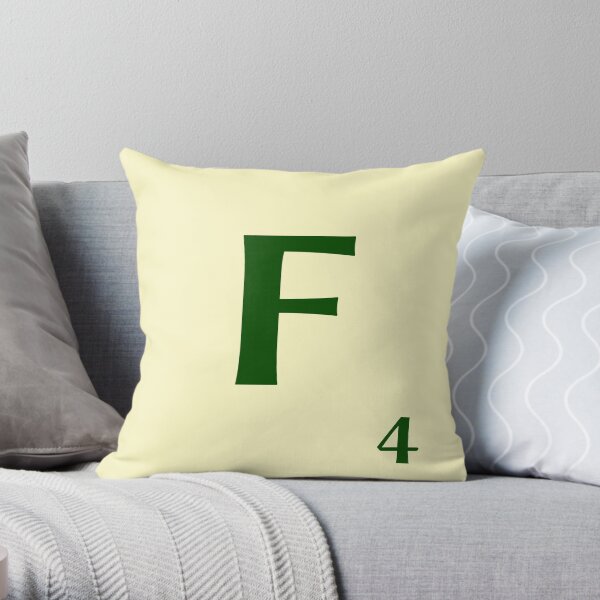 Ficha de Scrabble de la F de 4 puntos Cojín
