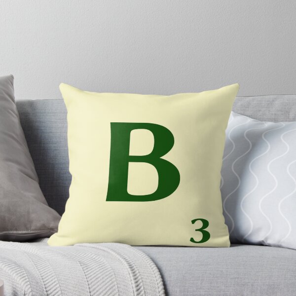 Ficha de Scrabble de la B de 3 puntos Cojín
