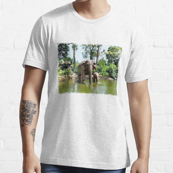 Baby elephant with her mother by the pond. Inspired by the Kulen Elephant Forest in Cambodia. Gentle Giant TV. Essential T-Shirt